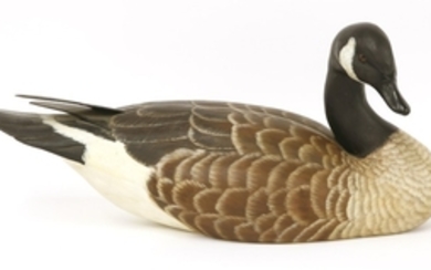 A carved and painted wood Canada goose