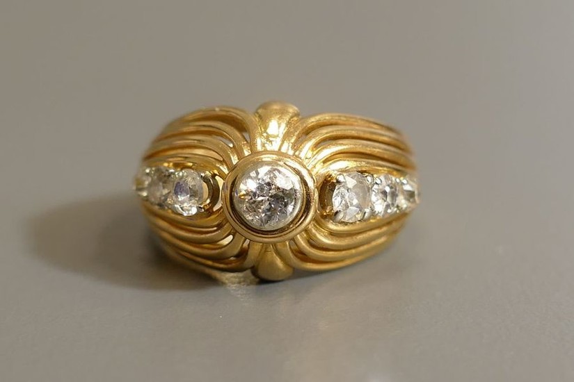 18 karat yellow gold ring set with diamonds...