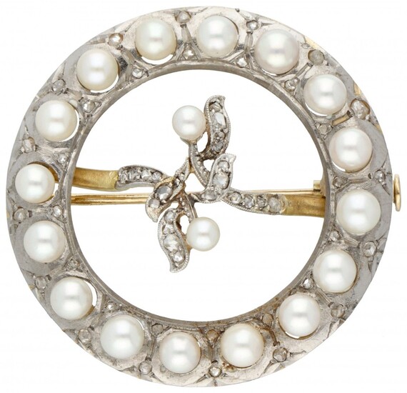 18K. Bicolor gold Art Nouveau brooch set with diamond and Akoya pearls.