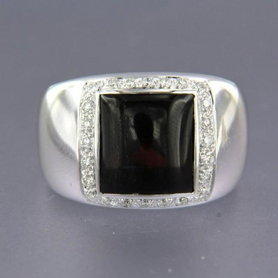 18k white gold ring set with garnet and diamond, total