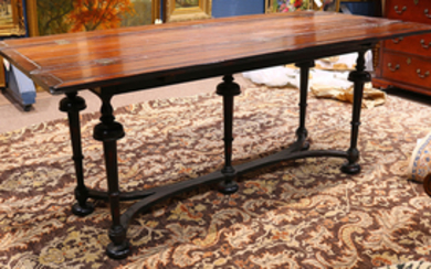Jacobean style mahogany drop leaf trestle table, having two hinged leaves, and rising on turned legs conjoined by a stretcher, 30"h...