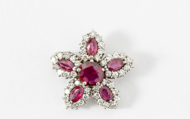 A 14 carat white gold, ruby and diamond flower brooch