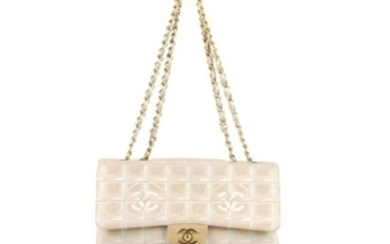 CHANEL - a pink Travel Line Flap handbag. Designed with