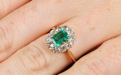 A Colombian emerald and old-cut diamond cluster ring.