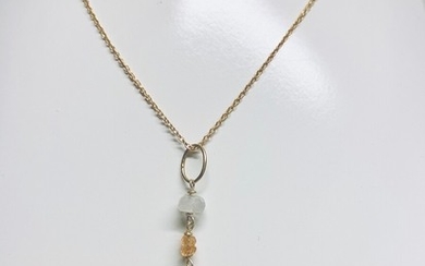 Lærke Trolle: Pendant (without necklace) of gilded sterling silver mounted with yellow sapphire and white moonstone. L. 3.1 cm.