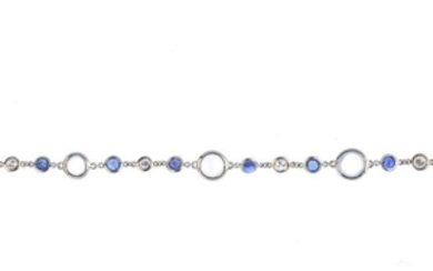 A moonstone, diamond and sapphire bracelet. Designed as