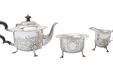 A silver shaped circular three piece tea service by S. Blanckensee & Son Ltd