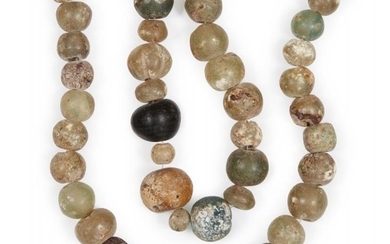 Two Roman glass bead necklaces, 2nd-8th century,...