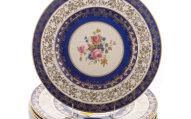 Eight floral decorated porcelain plates