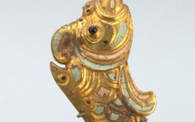 CHINESE INLAID GILT-BRONZE GIRDLE HOOK In the form of a fish dragon, with turquoise and glass inlay. Length 7.2".