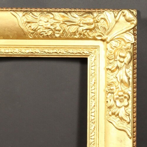 A 20th Century gilt composition frame, rebate size - 30" x 4...