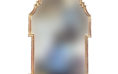 A 20th century Italian LaBarge giltwood mirror, the scrolled...