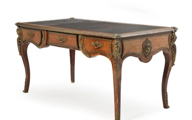 A 20th century free-standing Rococo style rosewood writing desk, front with three...