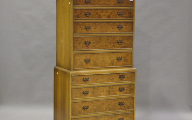 A 20th century reproduction burr walnut chest-on-chest, fitted with nine long drawers, height 172cm