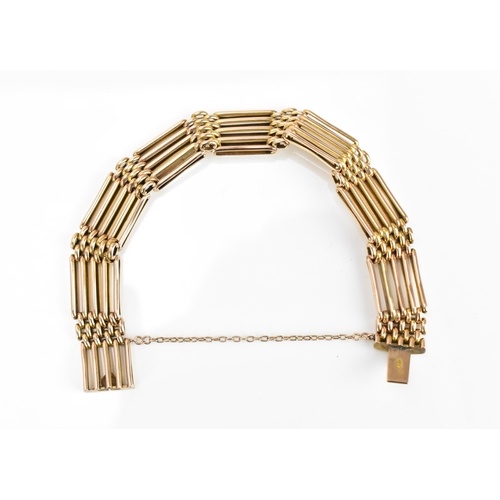 A 9ct rose gold gatelink bracelet, with articulated brick li...