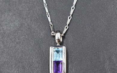A 9ct white gold pendant having blue topaz and amethyst style stones in a rectangular mount on a 9ct