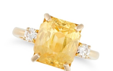 A CEYLON NO HEAT YELLOW SAPPHIRE AND DIAMOND THREE STONE RING set with a fancy cut yellow sapphire