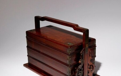 A CHINESE HARDWOOD THREE-TIERED PICNIC BOX AND COVER LATE QING...