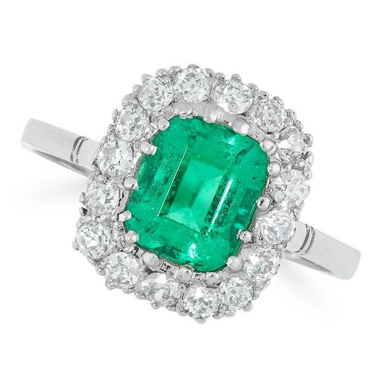 A COLOMBIAN EMERALD AND DIAMOND CLUSTER RING in