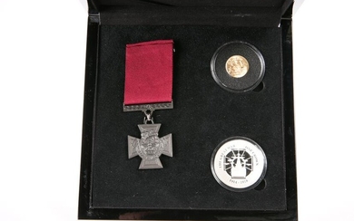 A COMMEMORATIVE COIN AND MEDAL SET, "THE FIRST WORLD
