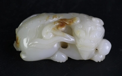 A Carved Jade Chinese Lion W: 8cm