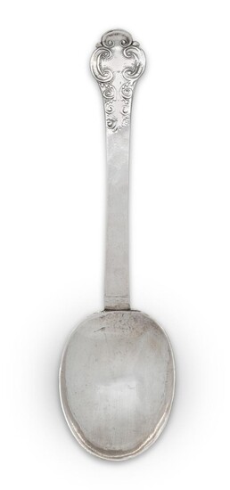 A Charles II lace-back silver trefid spoon, London, 1680, Thomas Cory (of Warminster), the reverse of the terminal prick dot engraved with the initials WP over EL, 1680, foliate scroll decoration to reverse of bowl and front of terminal, 18.2cm...