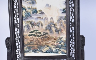 A Chinese Porcelain plaque decorated with landscape held in a fitted carved hardwood frame 67 x 45cm