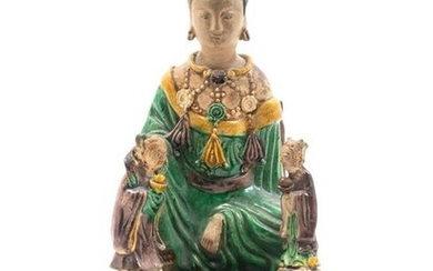 A Chinese Sancai Glazed Stoneware Figure of Seated