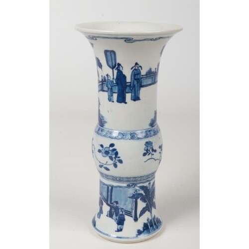 A Chinese blue and white gu shaped vase. Painted in undergla...