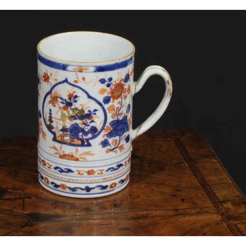 A Chinese export porcelain cylindrical mug, painted in the I...