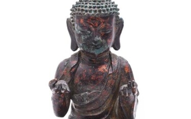 A Chinese lacquered gilt bronze figure of Buddha