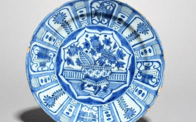 A Delft plate late 17th century, painted in...