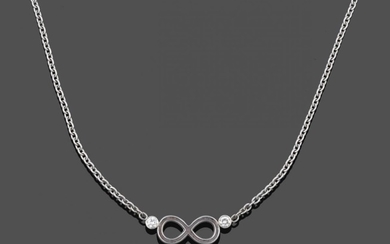 A Diamond 'Infinity' Necklace, the white infinity symbol terminates to...