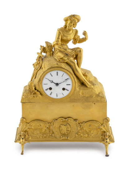 A French Empire Style Gilt Bronze Clock