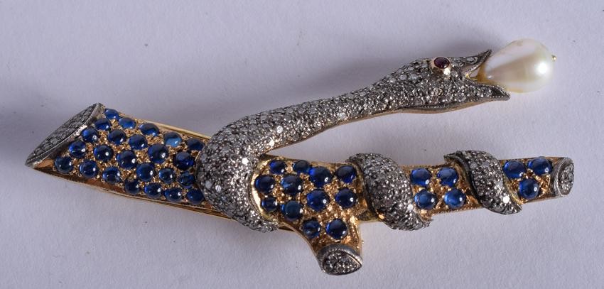 A GOOD GOLD DIAMOND RUBY AND SAPPHIRE SNAKE BROOCH.