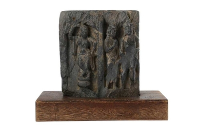 A GREY SCHIST CARVED RELIEF WITH A YAKSHINI AND TWO MALE FIGURES Ancient region of Gandhara, 2nd - 3rd century