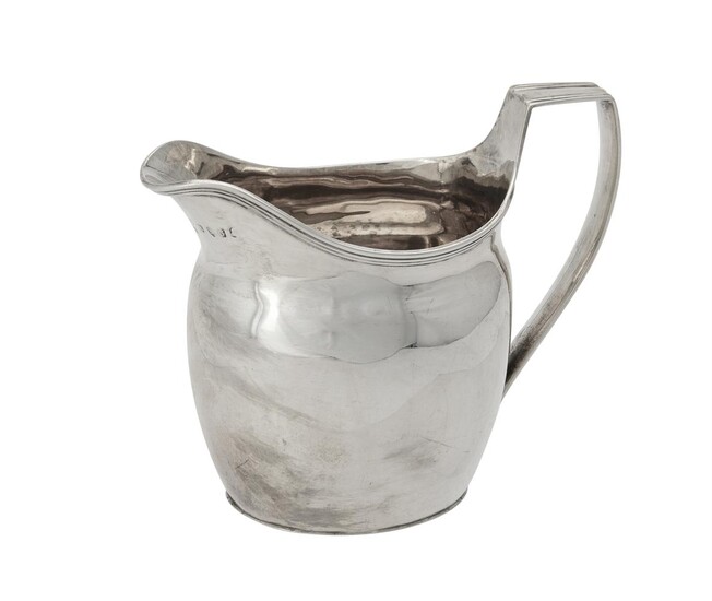 A George III silver oval cream jug by Robert, David and Samuel Hennell