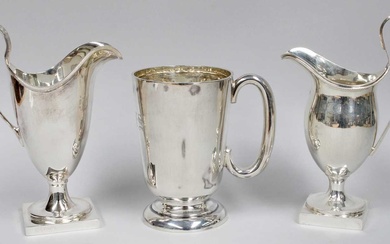 A George V Silver Mug and Two Cream-Jugs, the mug...