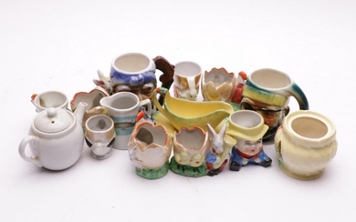 A Group Of Japanese Ceramics Incl Rabbit Themed pots Character Jugs, and others