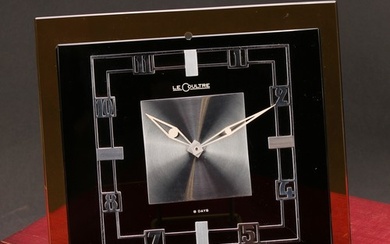 A Jaeger Le Coultre Art Deco clock, black glass rectangular ...