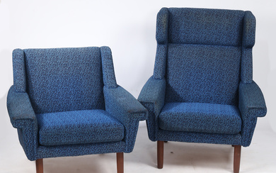 A PAIR OF 20TH CENTURY 'HIS AND HERS' WING BACK ARMCHAIRS.