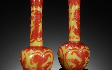 A PAIR OF CARVED RED-OVERLAY YELLOW GLASS BOTTLE VASES, 18TH-19TH CENTURY