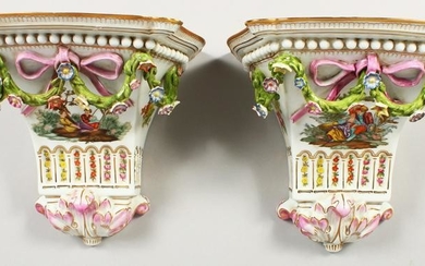 A PAIR OF SEVRES STYLE PORCELAIN WALL BRACKETS painted