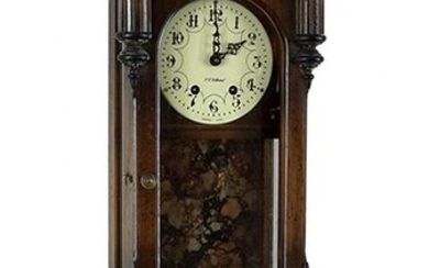 A P.F. Bollenbach Wall Clock.