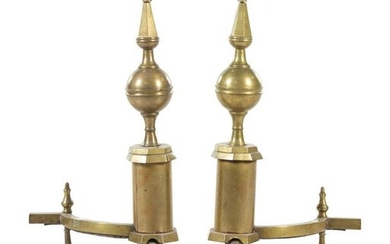 A Pair of Andirons Height 25 inches.