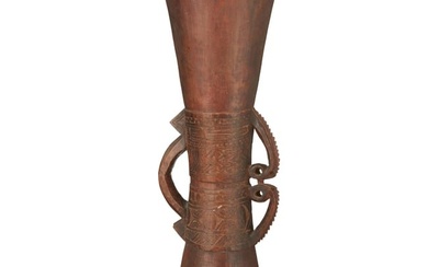 A Papuan Kundu hourglass drum