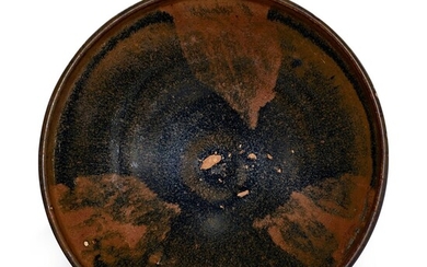 A RUSSET-SPLASHED BLACK-GLAZED BOWL JIN DYNASTY | 金 黑釉鏽斑盞