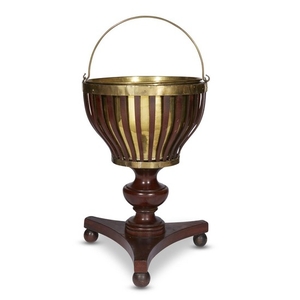 A Regency brass-bound and brass-lined mahogany spittoon first quarter...