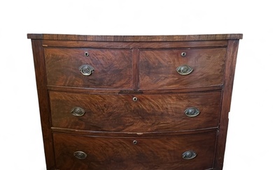 A Regency mahogany and rosewood crossbanded bow front chest ...