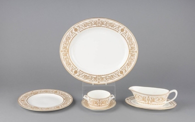 A Royal Worcester "Hyde Park" pattern gold decorated part luncheon set